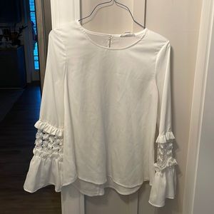 White blouse with bell sleeve